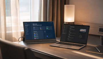 What Are the Ergonomic Challenges of Using Portable Monitors Without Adjustable Stands in Hotel Rooms?